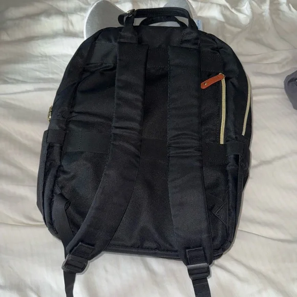 Black and Brown Backpack with Padded Straps and Durable Fabric - Picture 10 of 11